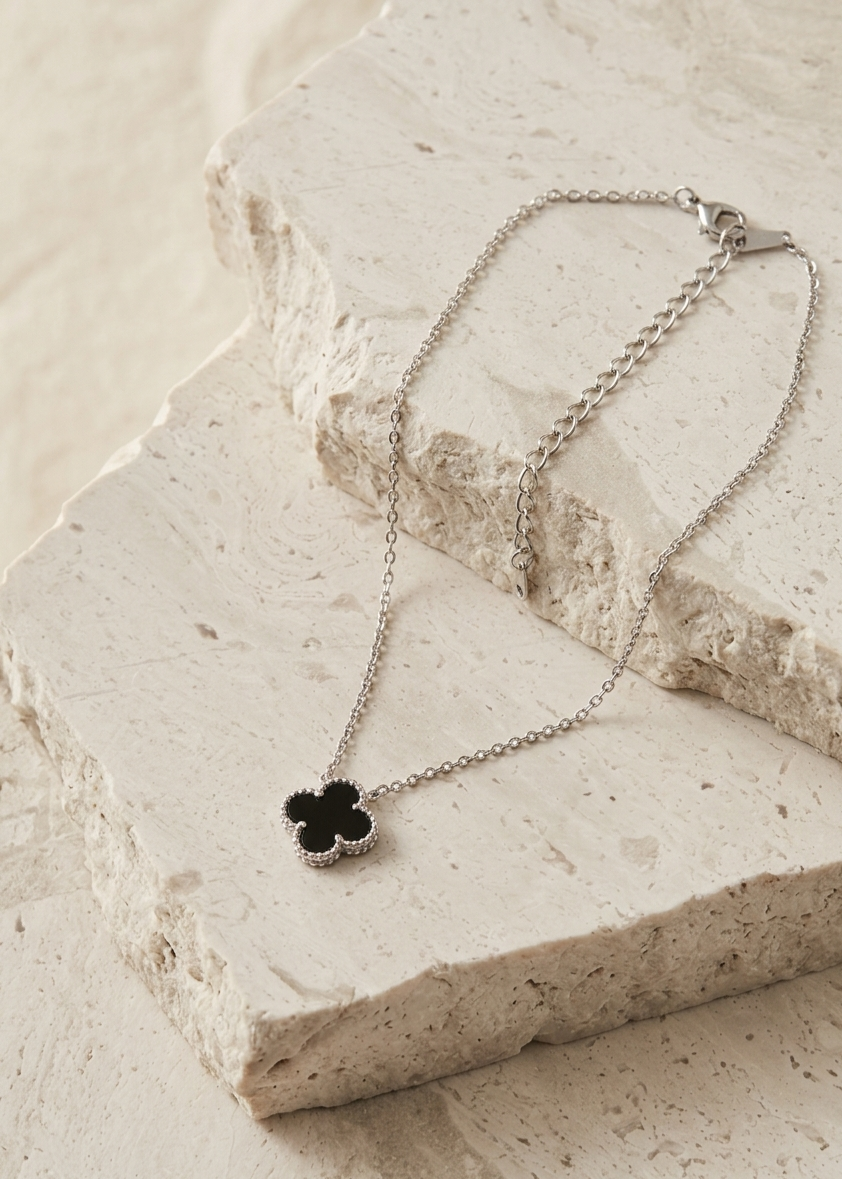 The Midnight Clover Charm
