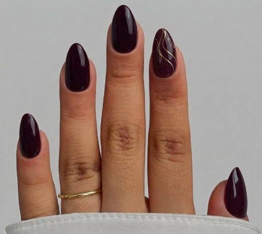 Merlot Gold Swirl Nails